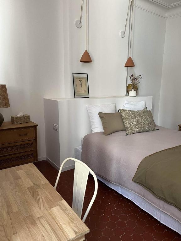 Postel nebo postele na pokoji v ubytování Maison Olea