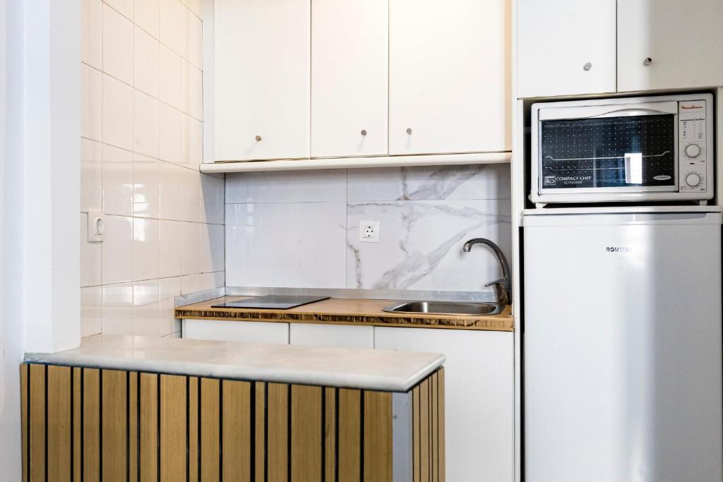 Kuchyňa alebo kuchynka v ubytovaní Suites Picasso Málaga
