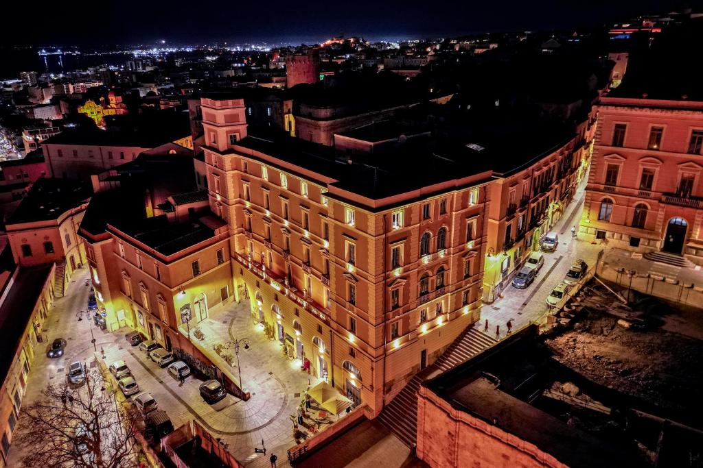 an overhead view of a building at night at Palazzo Boyl 1840 in Cagliari