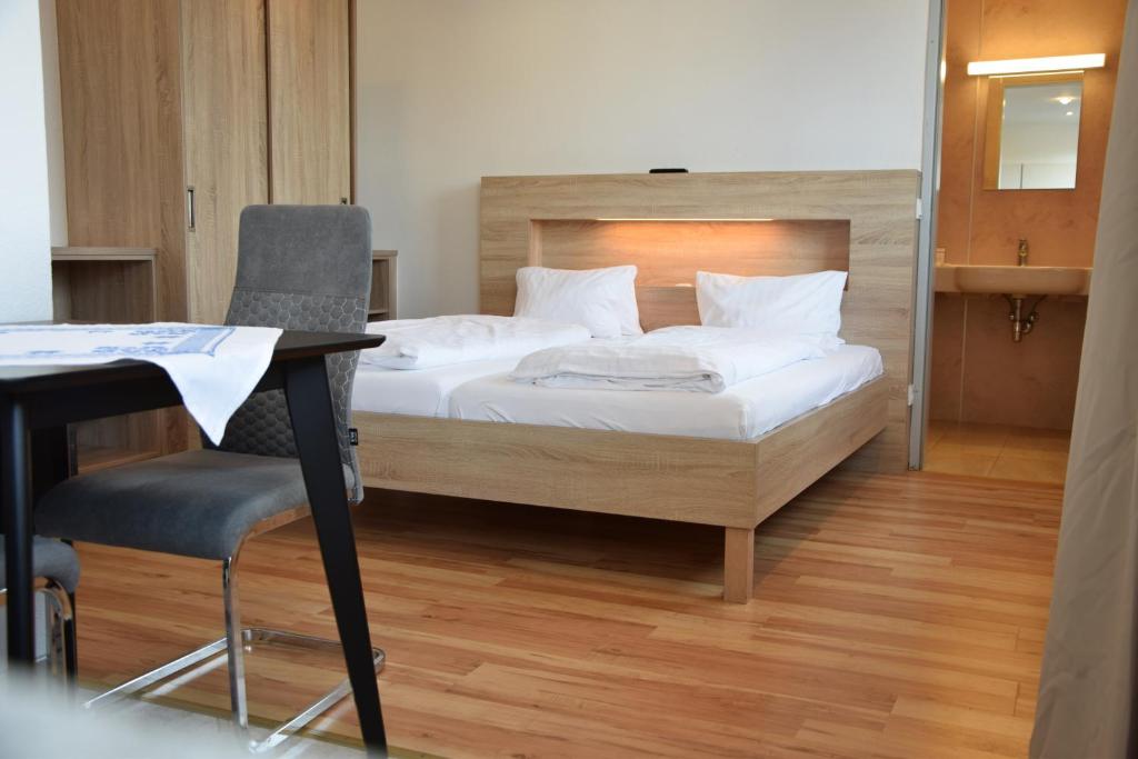 Postel nebo postele na pokoji v ubytování Appartmenthaus Rosenhof