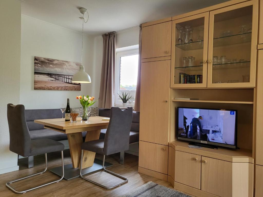 TV a/nebo společenská místnost v ubytování Apartment 74 im Haus Villa Anna II