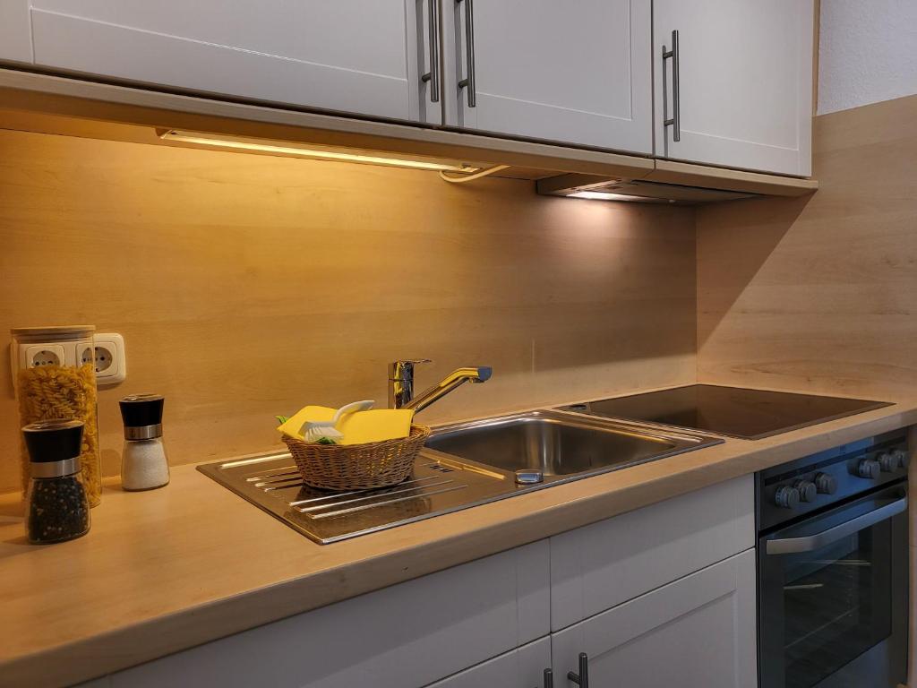 Kuchyň nebo kuchyňský kout v ubytování Apartment 74 im Haus Villa Anna II