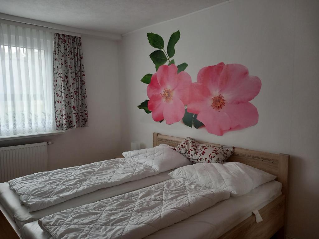 Postel nebo postele na pokoji v ubytování Feriencamp Trassenheide