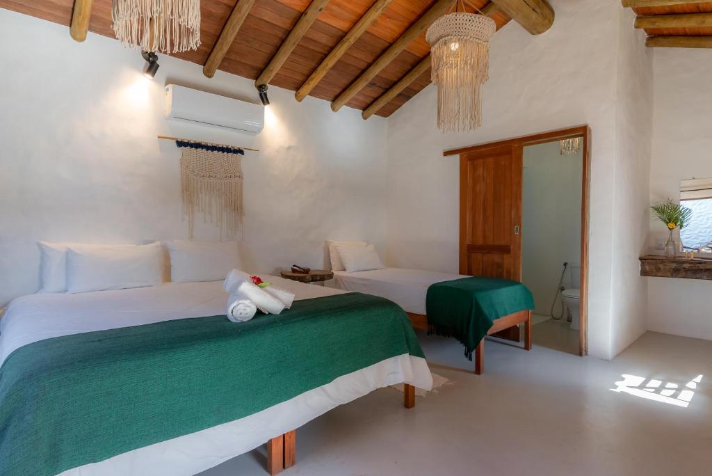 Villa Mediterrâneo Trancoso - Habitación Triple Con Vista Al Jardín