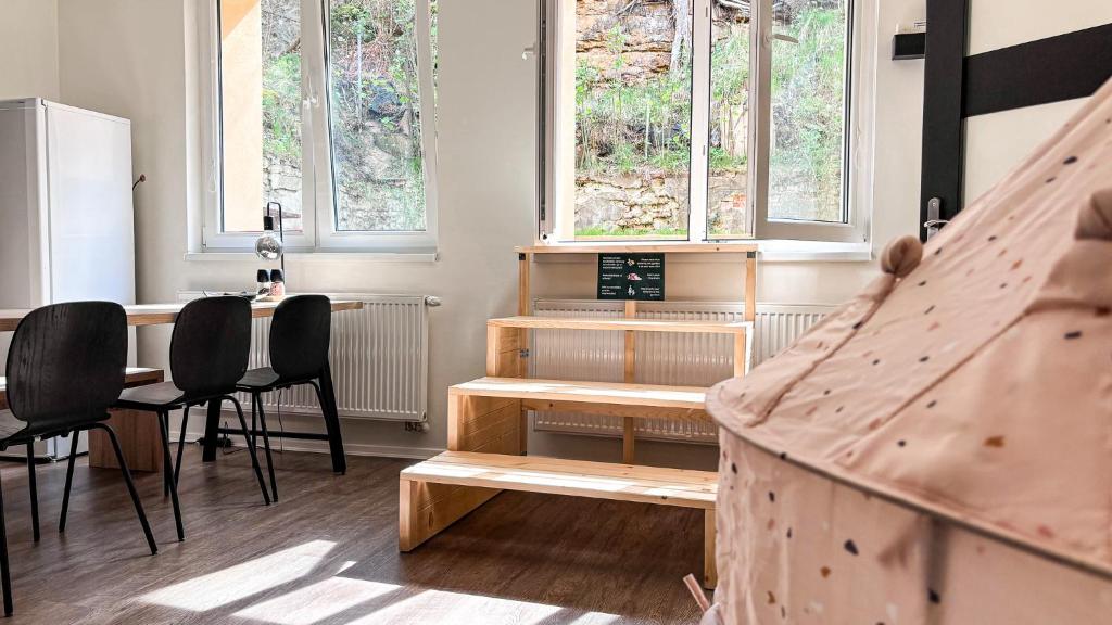 Posezení v ubytování Remote Work Friendly Zahradní apartmán u jezera