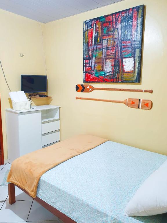 Postel nebo postele na pokoji v ubytování Babylon Village