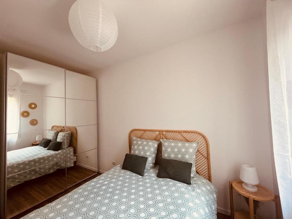 Postel nebo postele na pokoji v ubytování La villa Casa Vaunage