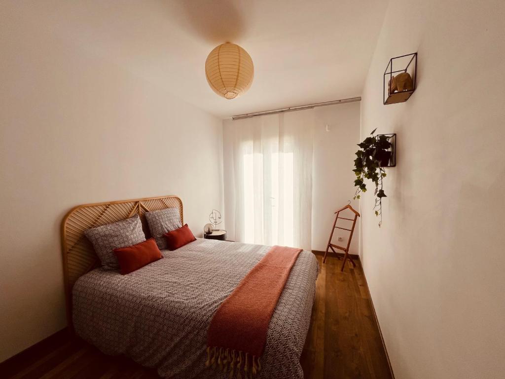 Postel nebo postele na pokoji v ubytování La villa Casa Vaunage
