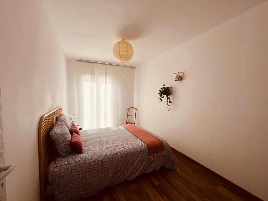 Postel nebo postele na pokoji v ubytování La villa Casa Vaunage