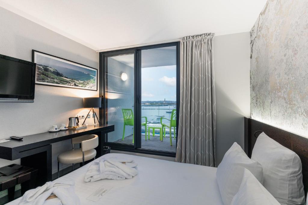 Postel nebo postele na pokoji v ubytování Le Thalassa Hôtel & Spa