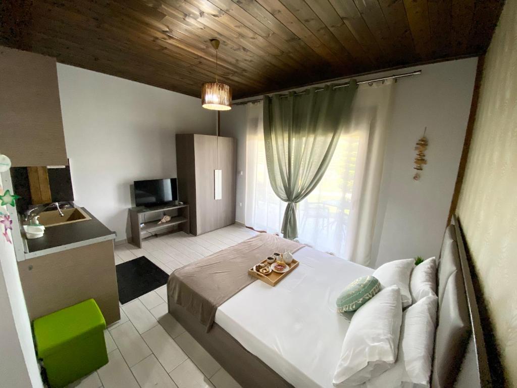 Postel nebo postele na pokoji v ubytování Aelia Studios