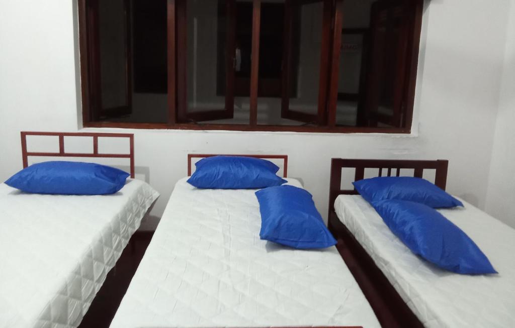 Cama o camas de una habitación en Colombo City Traveler