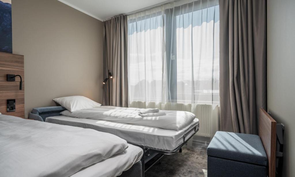 Postel nebo postele na pokoji v ubytování Thon Partner Stavanger Forum Hotel