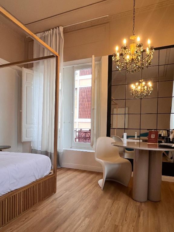 Postel nebo postele na pokoji v ubytování Clemente Rooms
