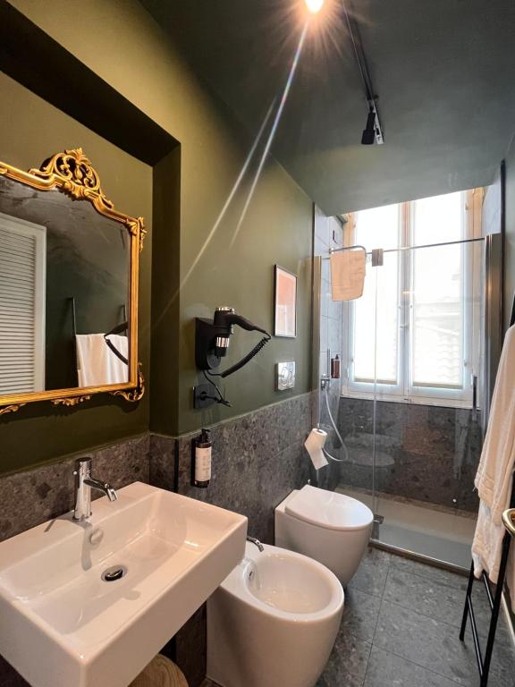 Koupelna v ubytování Clemente Rooms