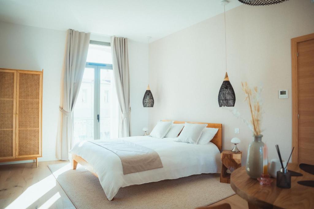 Postel nebo postele na pokoji v ubytování Maison Balas
