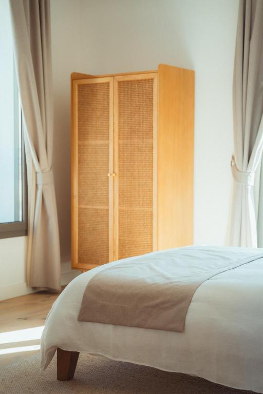 Postel nebo postele na pokoji v ubytování Maison Balas