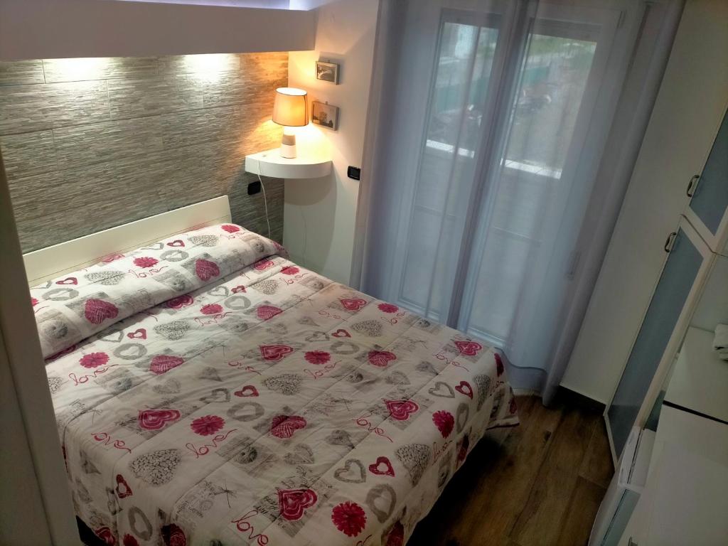 Postel nebo postele na pokoji v ubytování Re Mare B&B