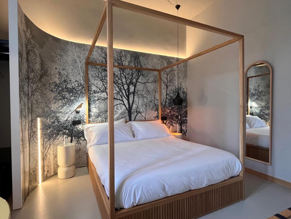 Postel nebo postele na pokoji v ubytování Clemente Rooms