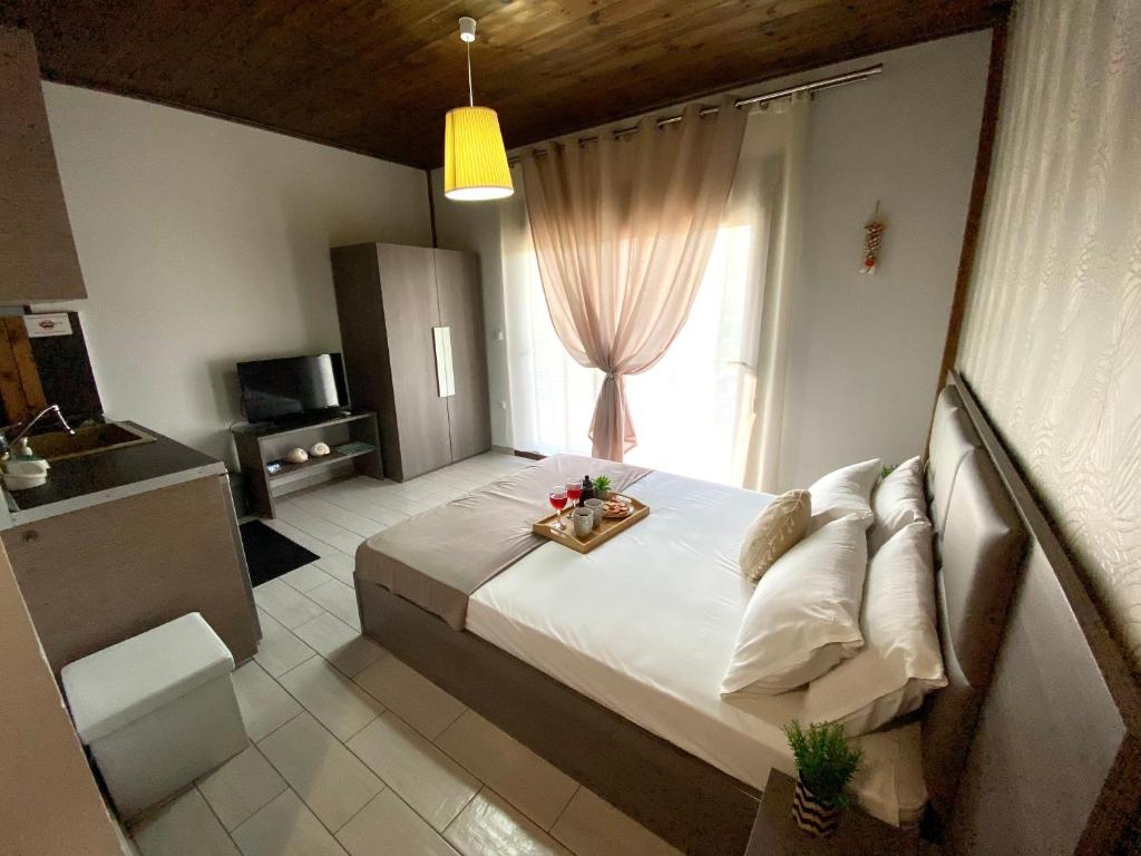Postel nebo postele na pokoji v ubytování Aelia Studios