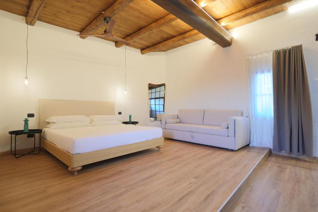 Postel nebo postele na pokoji v ubytování Valerio Resort beach club