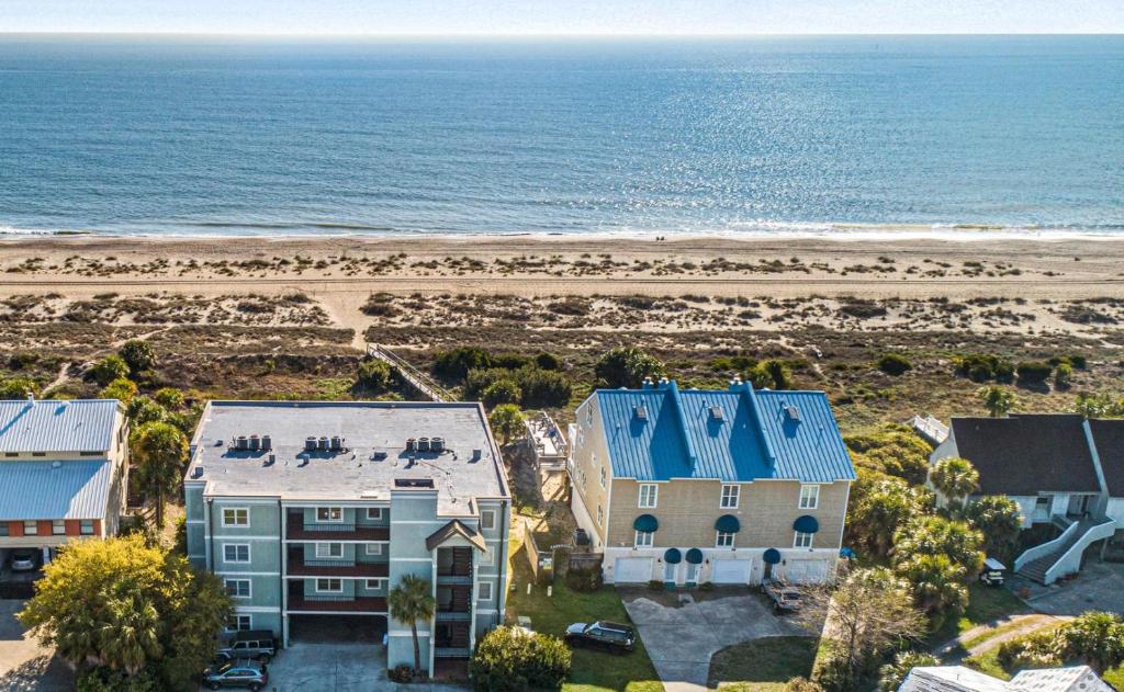 an aerial view of a house and the beach at Ocean Queen in Tybee Island
