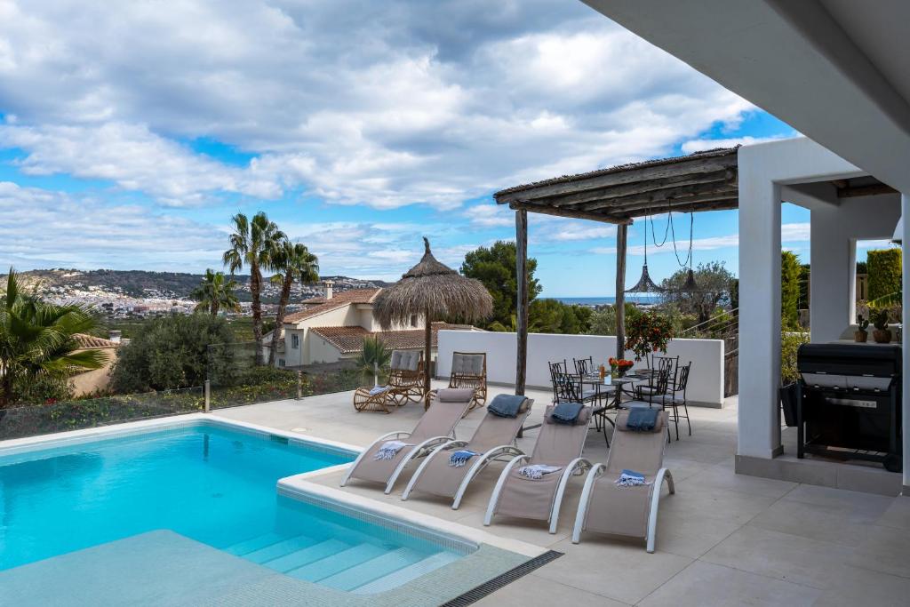 Πισίνα στο ή κοντά στο Ibiza Style Villa with pool by Prime Spanish Holidays