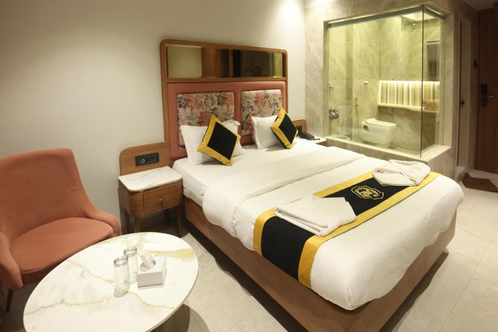 Postel nebo postele na pokoji v ubytování Hotel A R Paradise