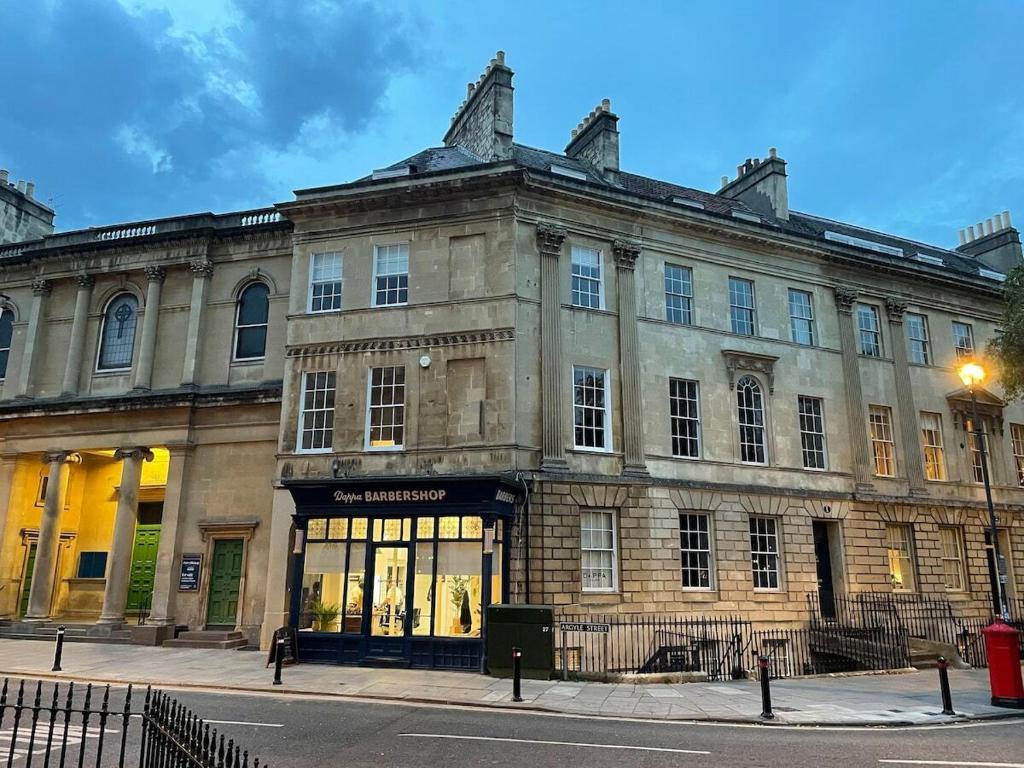 a large stone building on a city street at ※ Stunning, Bath Townhouse, City Centre (AS) ※ in Bath