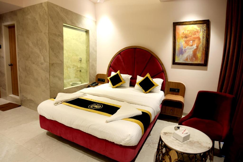Postel nebo postele na pokoji v ubytování Hotel A R Paradise