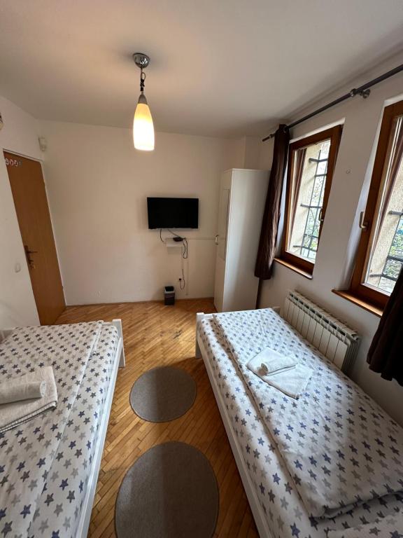 Letto o letti in una camera di One Love
