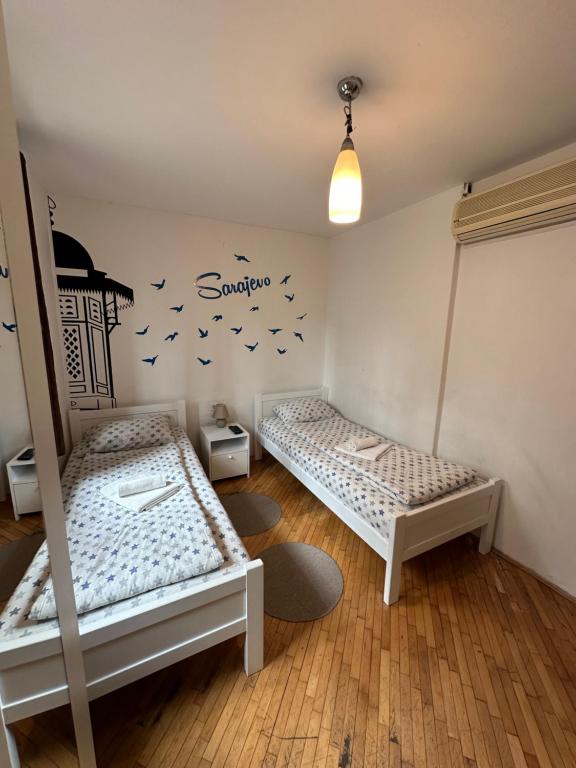 Letto o letti in una camera di One Love