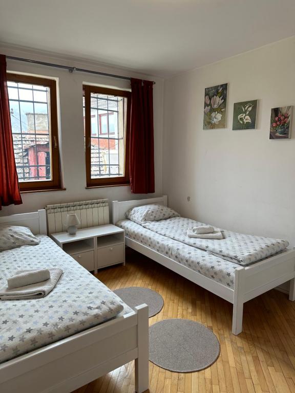 Letto o letti in una camera di One Love