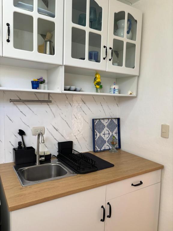 Kuchyň nebo kuchyňský kout v ubytování Apartamento en Juan Dolio