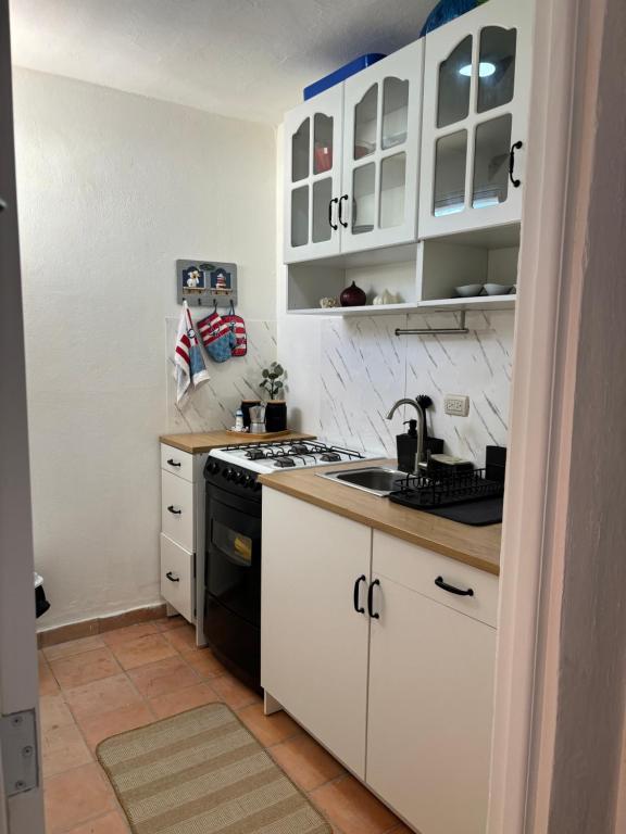 Kuchyň nebo kuchyňský kout v ubytování Apartamento en Juan Dolio