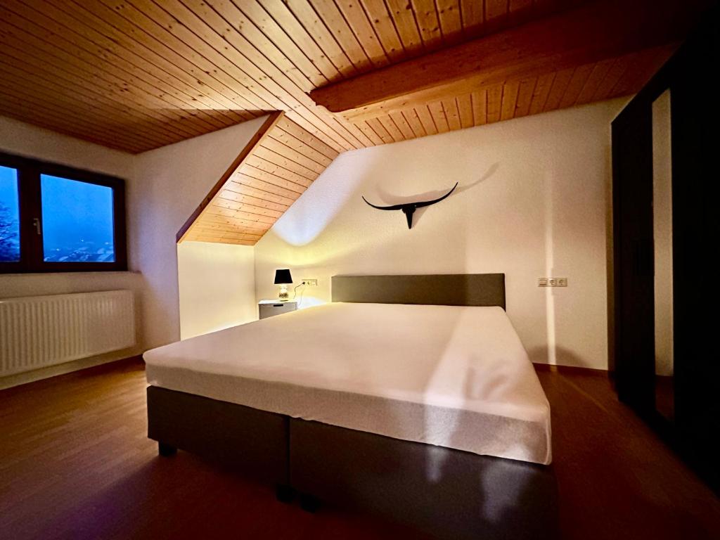 Postel nebo postele na pokoji v ubytování Ferienwohnung Olymp (2,5 Zimmer)