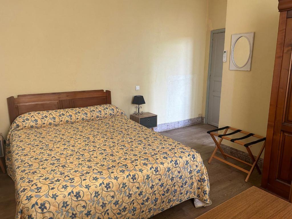 Postel nebo postele na pokoji v ubytování Le Parc aux Cedres