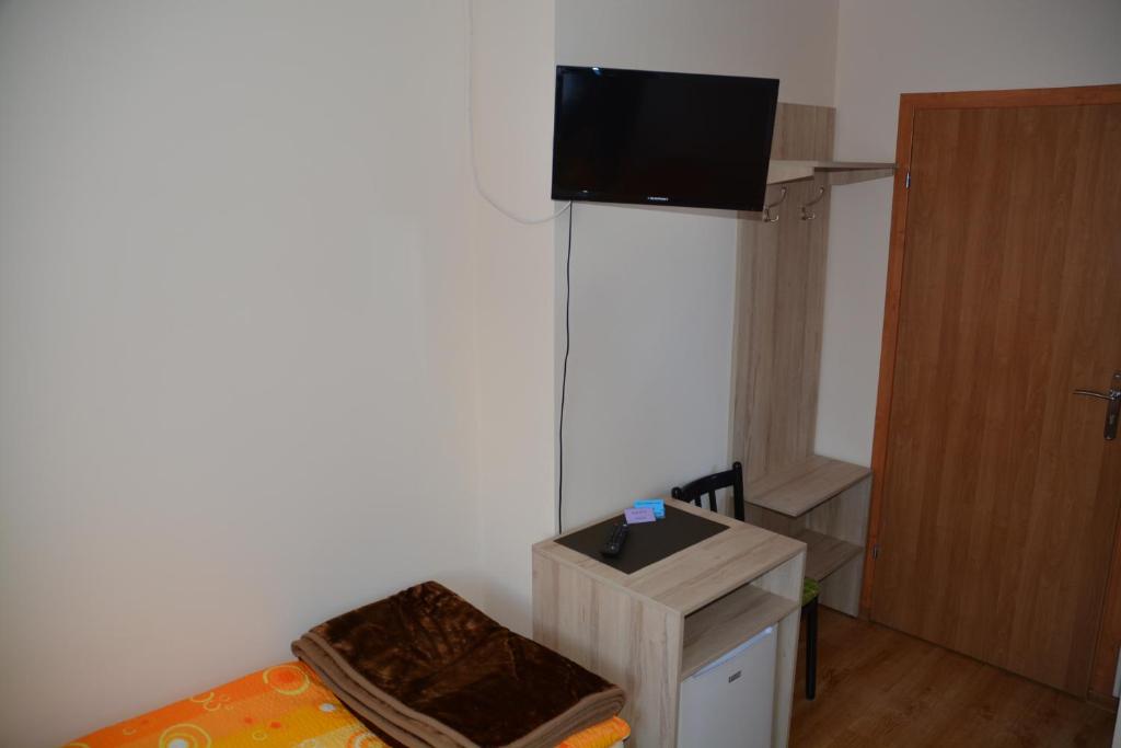 Televízia a/alebo spoločenská miestnosť v ubytovaní Pokoje Gościnne u Agaty