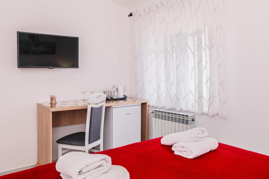 Postel nebo postele na pokoji v ubytování Bed and Breakfast Ema