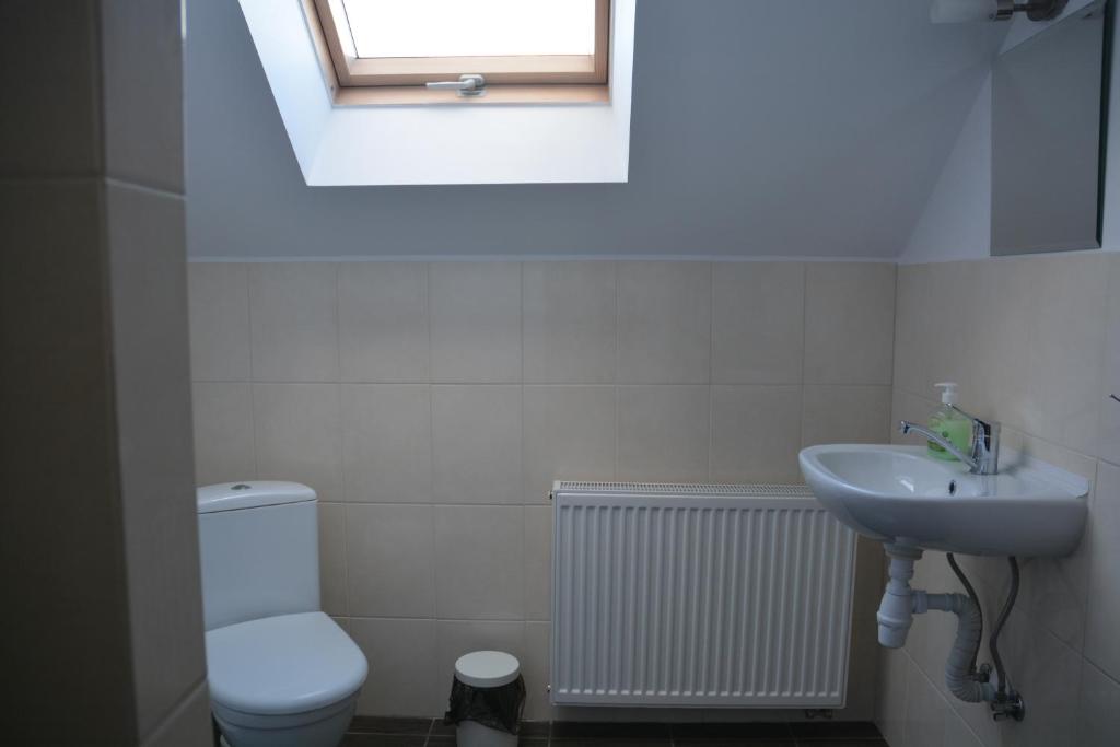 Kúpeľňa v ubytovaní Pokoje Gościnne u Agaty