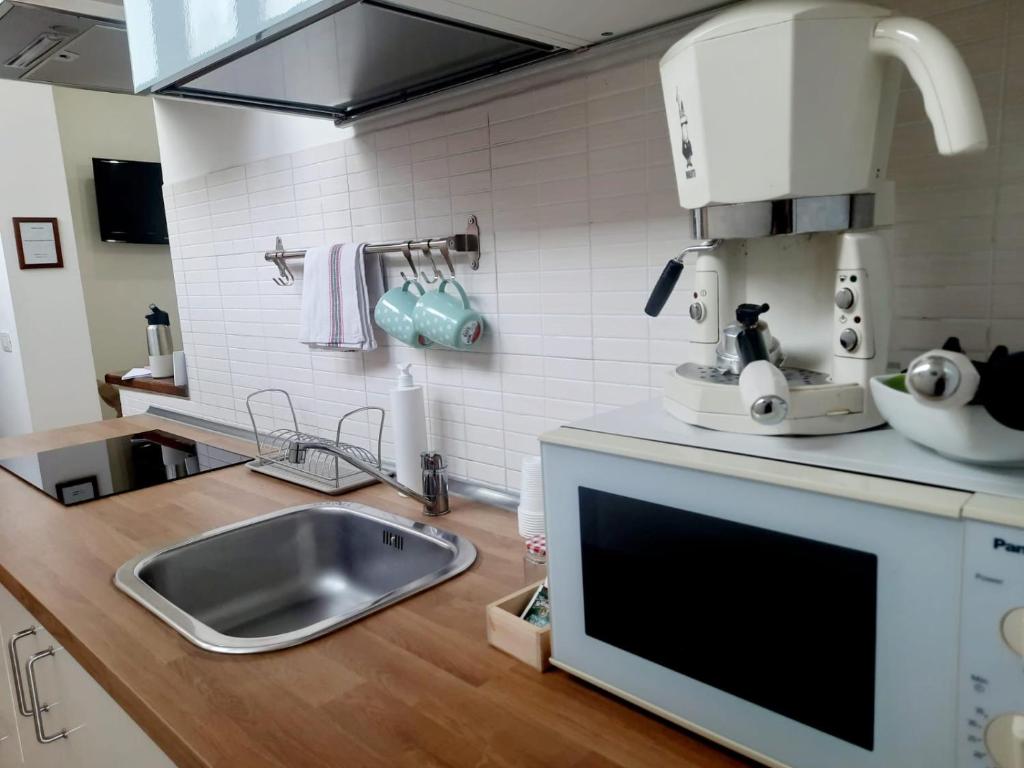 Kuchyň nebo kuchyňský kout v ubytování Casa sul Serapeo