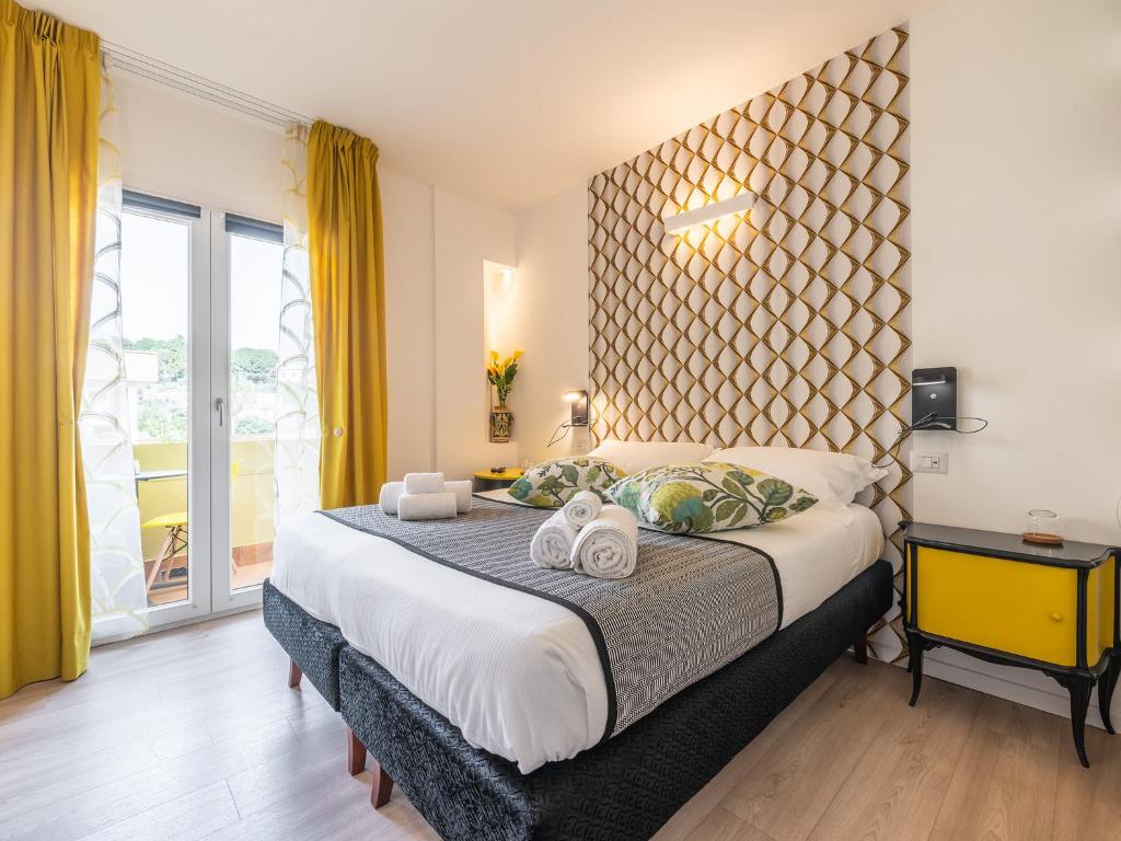 A bed or beds in a room at Le residenze di Carlà - Stampace
