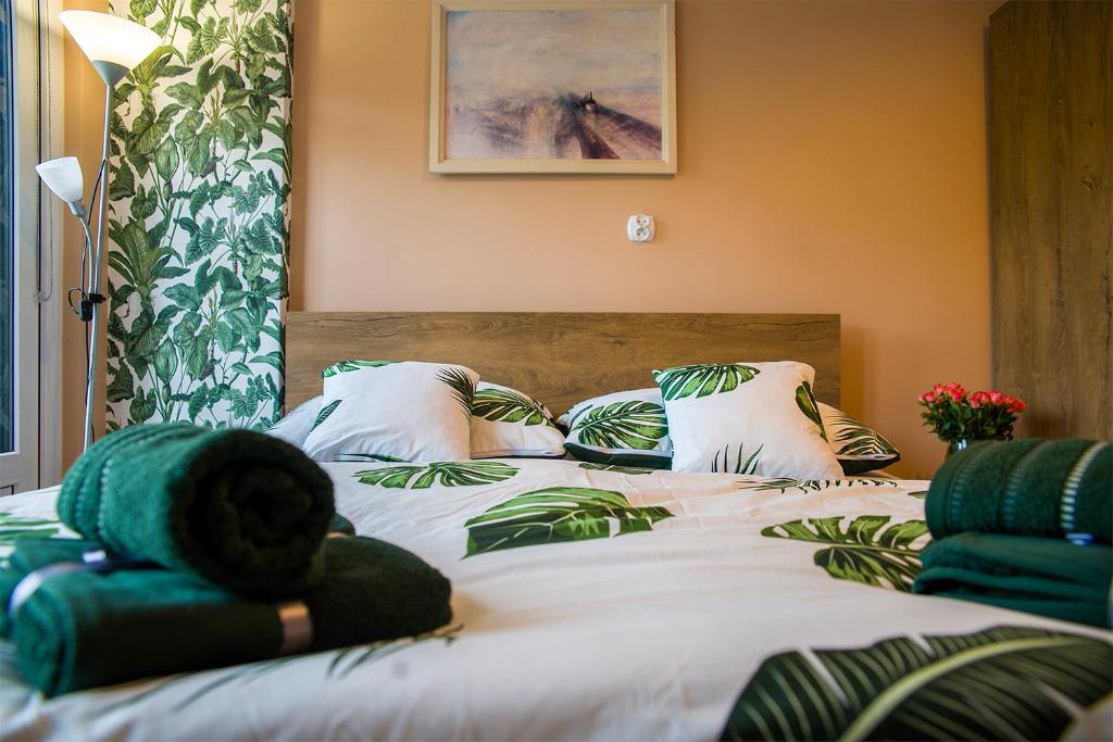 Llit o llits en una habitació de Apartament Reset Ustroń Jaszowiec
