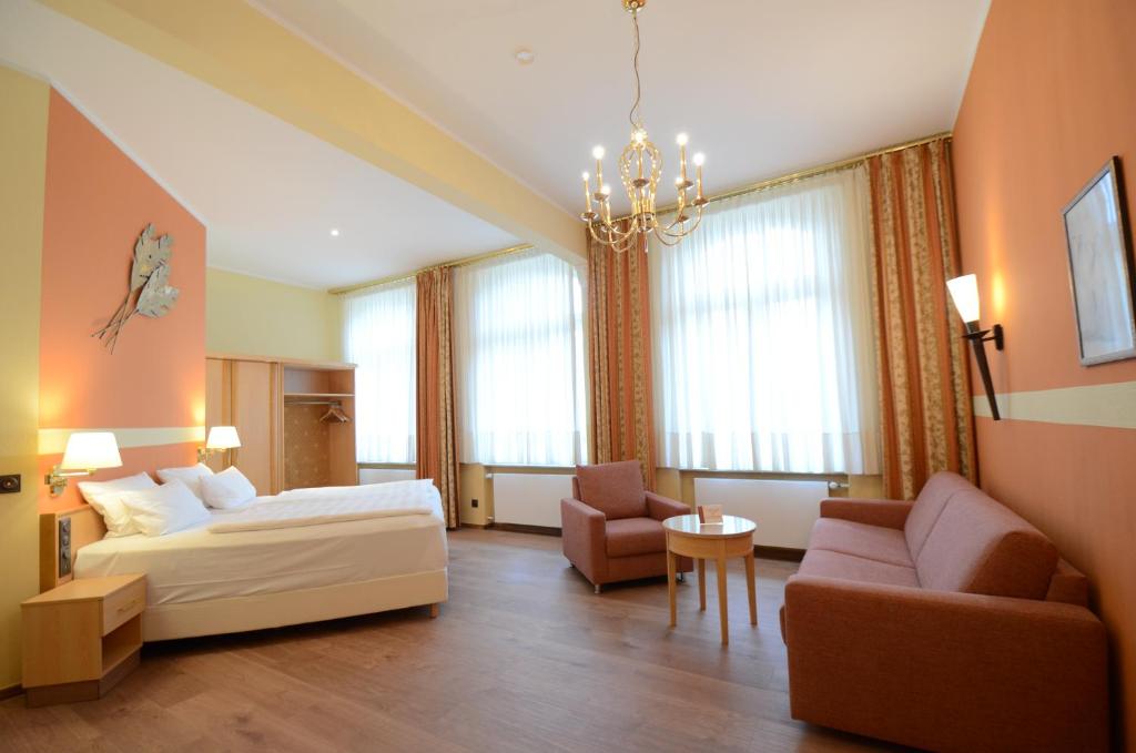 Postel nebo postele na pokoji v ubytování Hotel Mack Private Inn