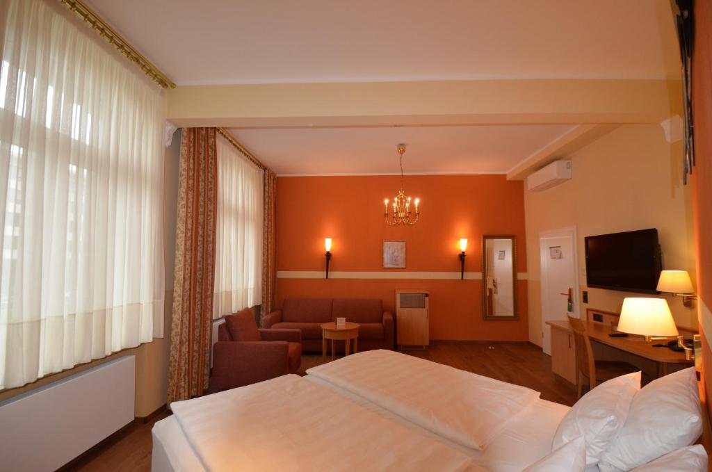 TV a/nebo společenská místnost v ubytování Hotel Mack Private Inn