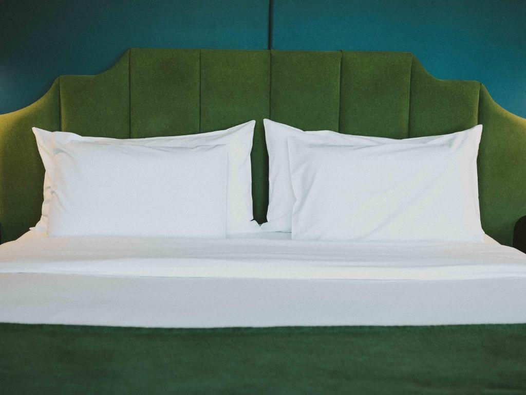 Postel nebo postele na pokoji v ubytování Hotel Eco Boutique Bidasoa