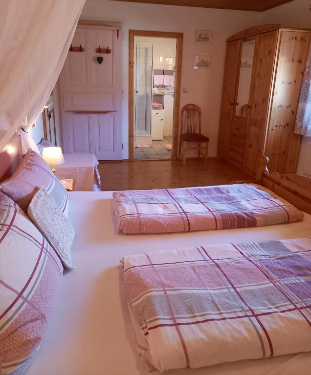 Postel nebo postele na pokoji v ubytování Winzerhof Fleischmann