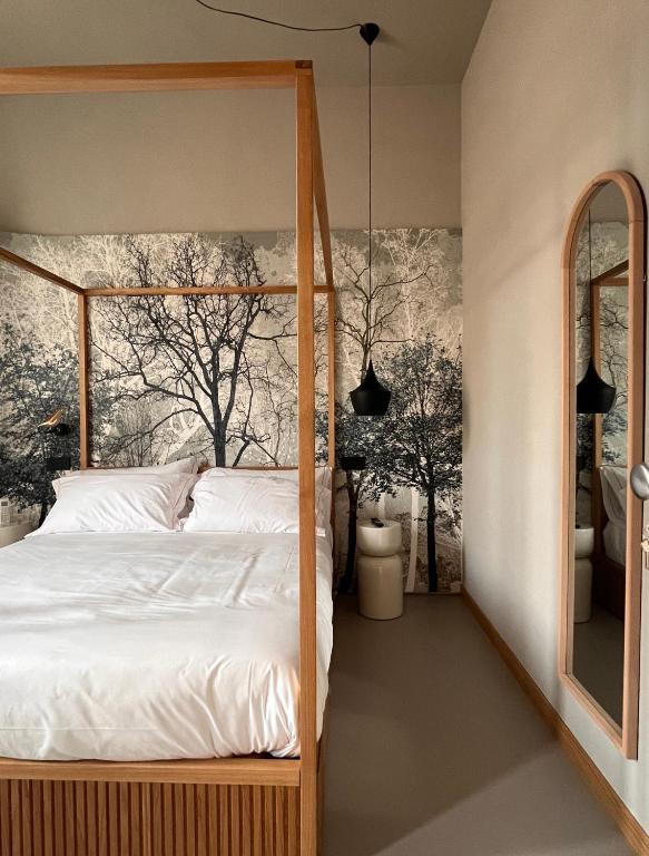 Postel nebo postele na pokoji v ubytování Clemente Rooms