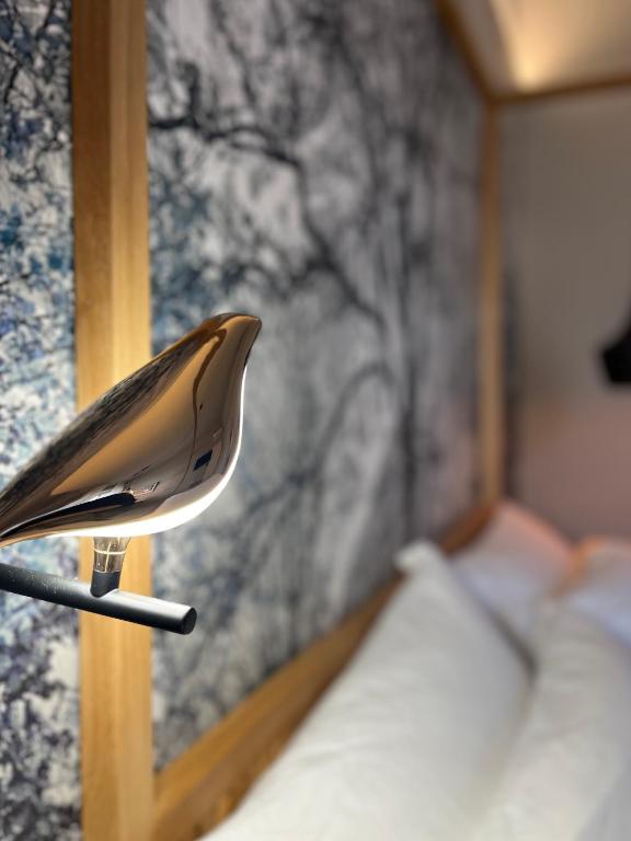 Postel nebo postele na pokoji v ubytování Clemente Rooms