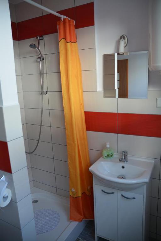 Kúpeľňa v ubytovaní Pokoje Gościnne u Agaty